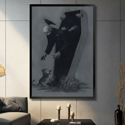 Framed canvas wall art of a gothic skeleton figure emerging from a black coffin with a crow perched on its skull and a small animal at its feet among wildflowers, displayed on a grey tile wall in a moody modern living room