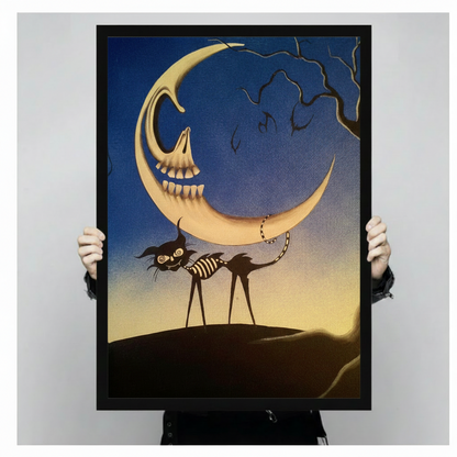 Hands holding large framed gothic skeleton moon black cat canvas print - full artwork detail of grinning skull crescent moon long-legged skeleton cat striped ribcage and twisted bare tree on deep blue night sky