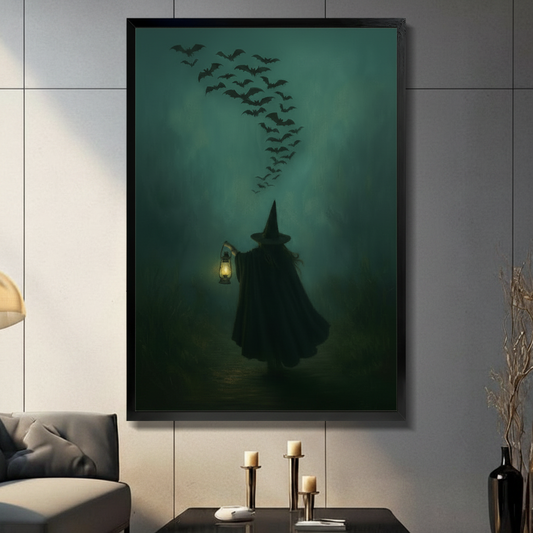 Framed gothic witch wall art with bat swarm and glowing lantern, dark teal canvas print displayed in modern living room above console table