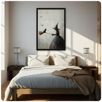 Framed gothic romantic oil painting young witch in flowing black gown holding broomstick with black cat sitting on broom tip and bats in flight on aged cream textured background canvas print above wooden bed in sunlit minimalist bedroom - enchanting Halloween witch and black cat wall art for contemporary bedroom home decor