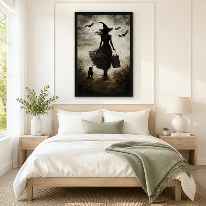 Woman holding a black-framed gothic witch and black cat art print showing scale and dark sepia oil painting texture