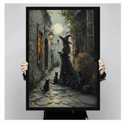 Witch and black cats lantern alley framed canvas print held up against a light gray background showing full gothic oil painting detail