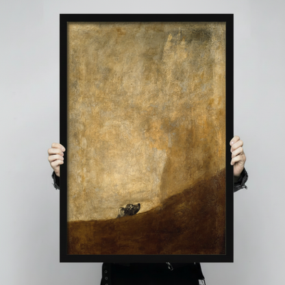 Person holding Goya The Dog black framed art print showing scale and size reference against neutral background