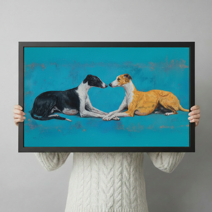 Hand-held black framed canvas print featuring greyhound duo oil painting — horizontal dog lover wall decor