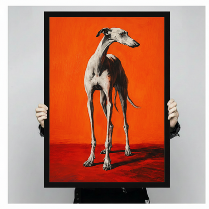 Hand-held size reference of framed greyhound full-body oil painting print on bold orange background, showing portrait orientation and black frame detail