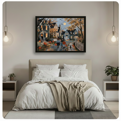 Framed Halloween neighborhood scene wall art hung above a white linen bed in a soft neutral bedroom, depicting costumed children with pumpkin buckets under a full harvest moon