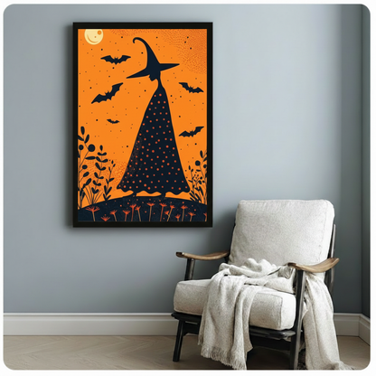 Black framed Halloween witch hat silhouette with flying bats and wildflowers on orange background beside white linen accent chair