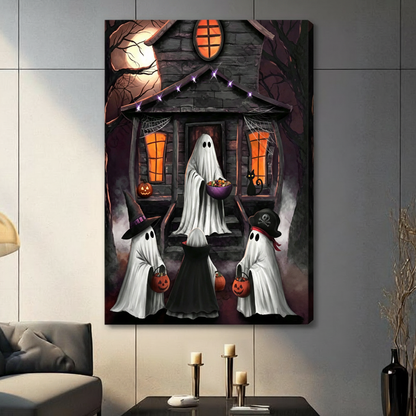 Stretched Halloween canvas shows a haunted house with glowing windows, ghost figures, pumpkins, and visible wrapped side depth.
