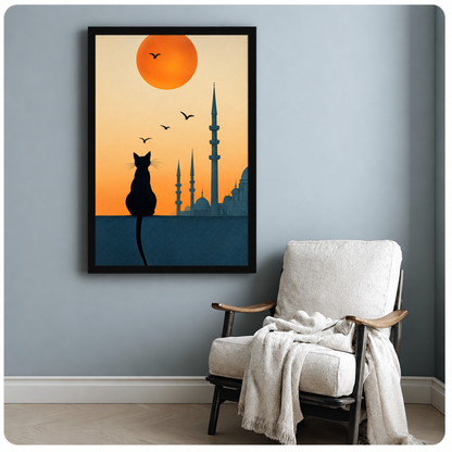 Minimalist illustration of a black cat silhouette sitting on a ledge facing an Istanbul mosque skyline under a large orange sun with flying birds wall art framed print beside armchair blue-gray wall