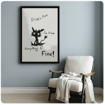 Black framed it's fine cat quote art print on blue-gray wall beside white armchair, witty hand-drawn cat illustration for home decor