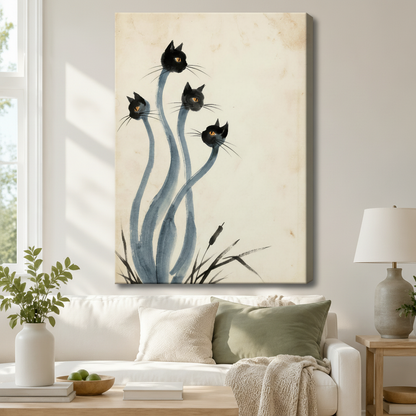 Stretched canvas Japanese ink style black cats wall art featuring four whimsical black cat heads with golden eyes on sinuous blue-gray stems growing from ink grass on an aged cream background, hung above a white sofa with sage green pillows in a bright living room