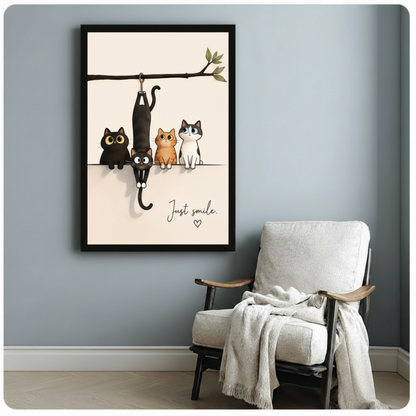 Black framed "Just Smile" cat wall art print – whimsical cats hanging on tree branch illustration – cute minimalist pet quote poster for living room reading nook decor