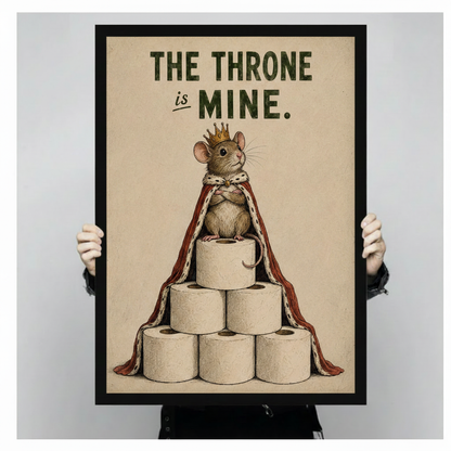large framed vintage humorous illustration regal mouse with gold crown and red royal mantle perched on stacked toilet paper rolls with bold typography The Throne Is Mine on distressed beige background canvas print with both hands against light grey background - close up size reference of funny bathroom king mouse toilet paper wall art with black frame finish