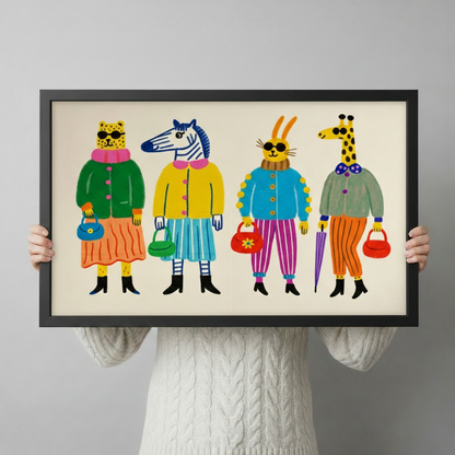 Large fashion animal gang art print with black frame held up for size reference, vibrant illustrated leopard zebra rabbit giraffe poster