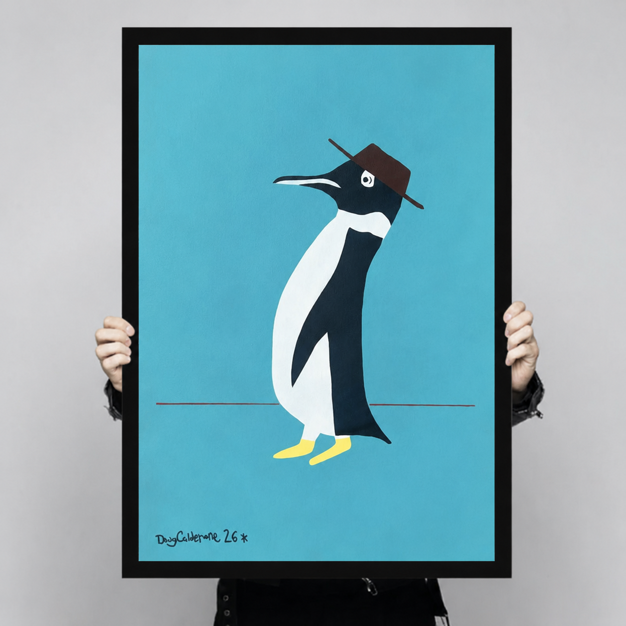 Large penguin with brown hat art print with black frame held up for size reference, bold flat design teal background animal poster