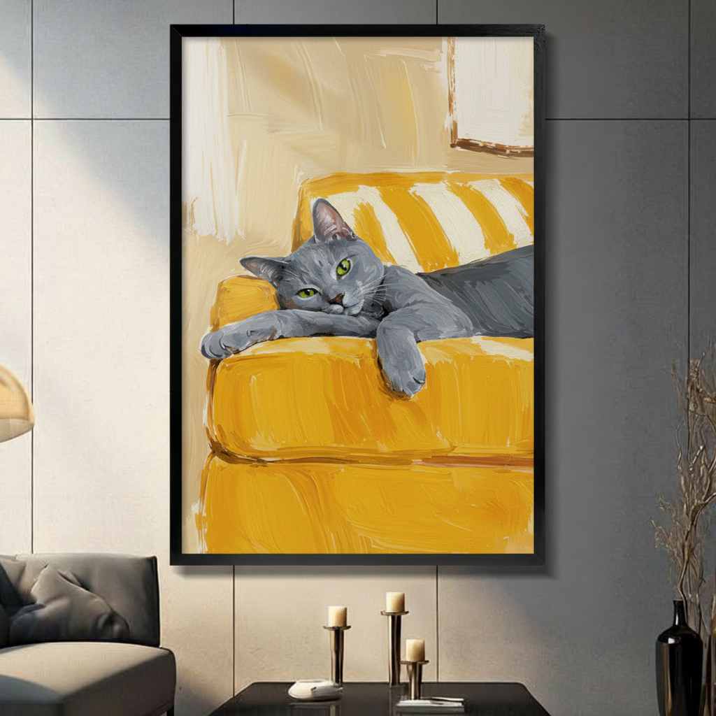 Framed oil painting canvas wall art of a lazy grey cat with green eyes lounging on a mustard yellow sofa displayed on a dark grey wall in a modern living room