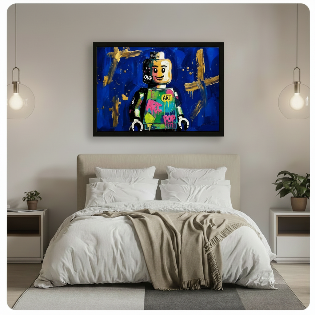 Framed Lego pop art canvas hung above bed in modern bedroom, cobalt blue graffiti wall art decor