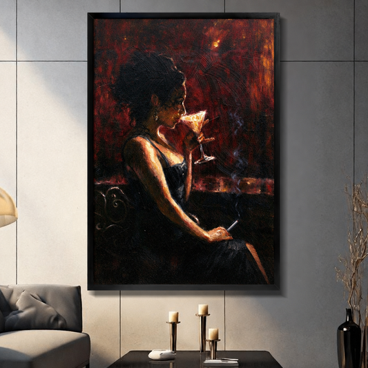 Framed cocktail woman wall art displayed above a sofa and candlelit coffee table against gray wall panels.