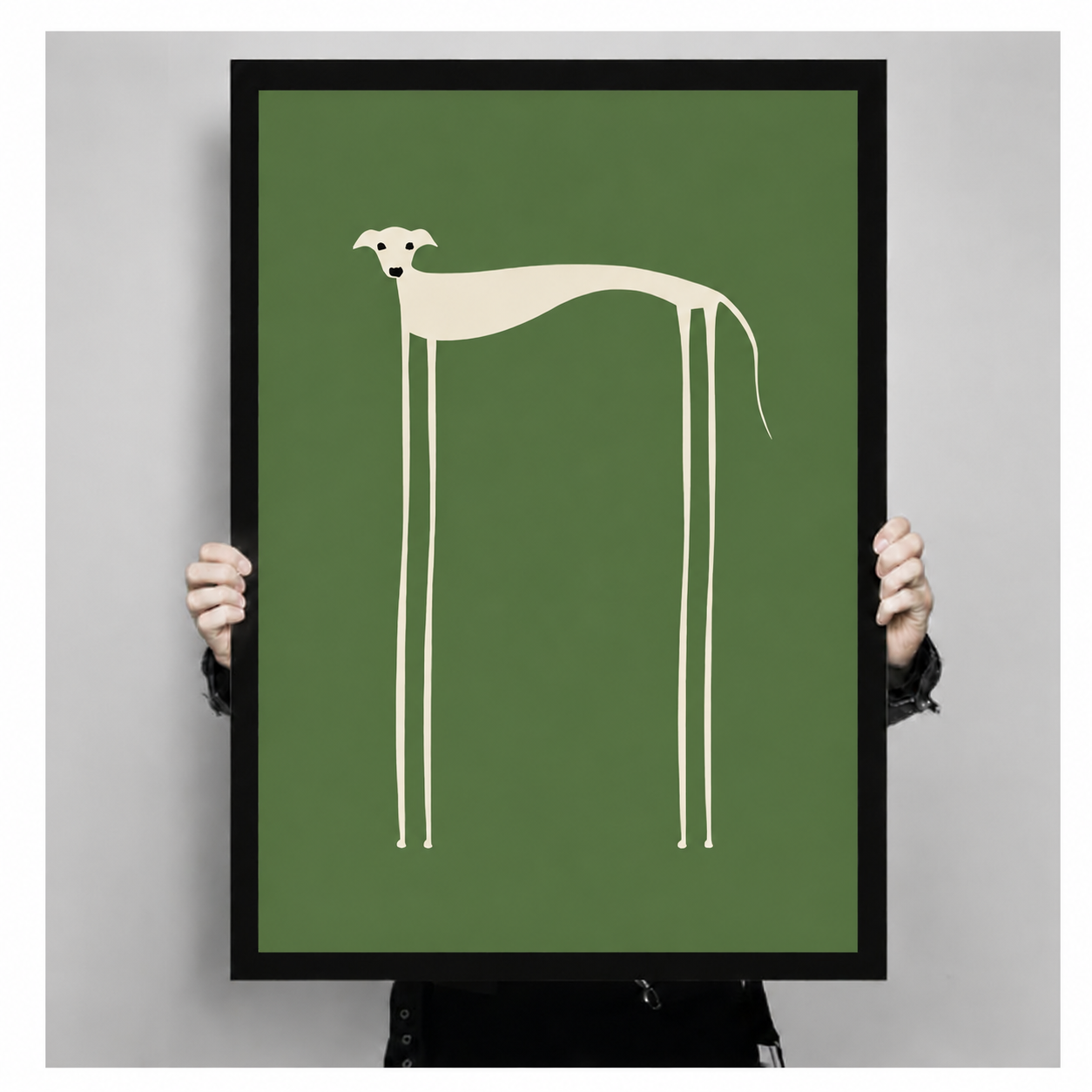 Hand-held close-up of framed long-legged dog minimalist wall art print on green background