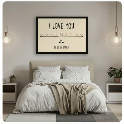 Black framed romantic stick figure I Love You Thiiiiiis Much canvas wall art hung above a beige upholstered bed with white linen bedding in a minimalist bedroom with glass globe pendant lights