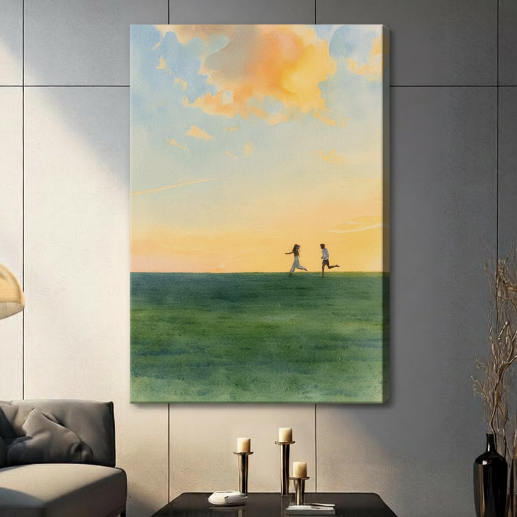 Two figures running freely across lush green field beneath warm golden sky with peach clouds, stretched canvas print displayed on grey wall in contemporary living room