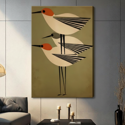 Unframed stretched canvas print of three stacked geometric shorebirds with orange heads and bold black striped wings in mid-century modern style on olive khaki background