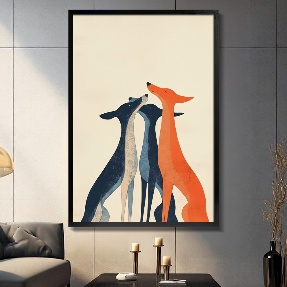 Framed minimalist wall art print of three elegant greyhounds in navy blue and orange tones on a cream background, displayed above a console table in a modern living room