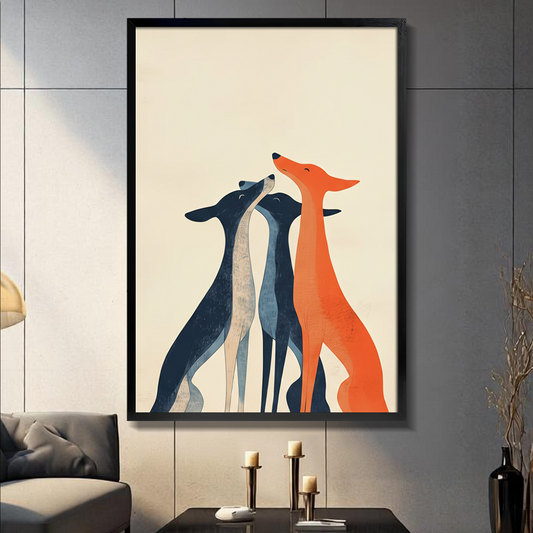 Framed minimalist wall art print of three elegant greyhounds in navy blue and orange tones on a cream background, displayed above a console table in a modern living room