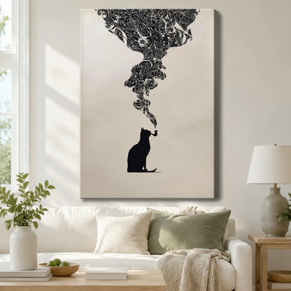 Minimalist black cat silhouette smoking pipe gallery wrap canvas art with ornate smoke cloud above a white sofa with sage green cushions, a knit throw blanket, and a ceramic table lamp