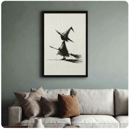 Black framed minimalist witch broom canvas print hung on a warm beige wall above a grey sofa, styled in a modern living room with text overlay