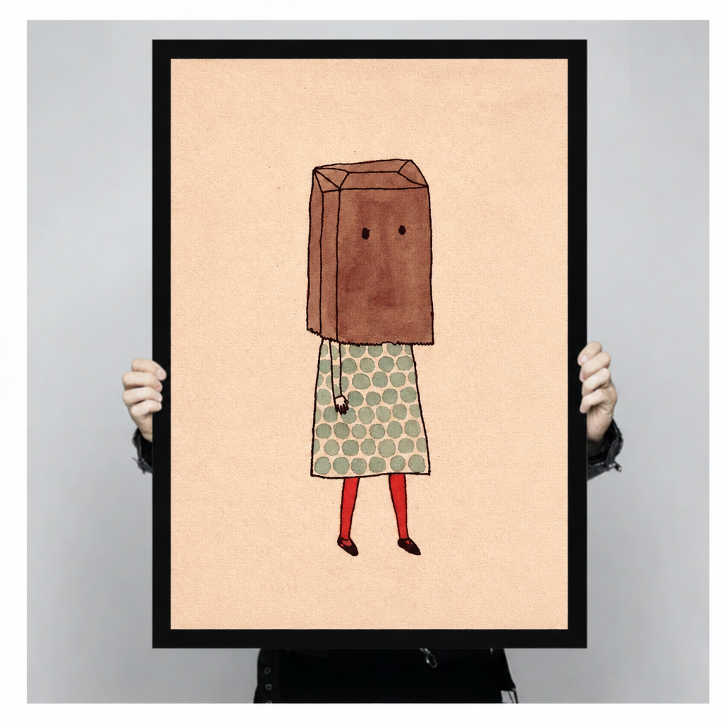 Handheld framed print of a paper bag girl in a polka-dot dress against peach.