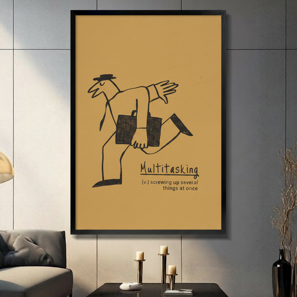 Multitasking funny definition canvas wall art — bold black line art on golden yellow background in black frame, main product view on light gray wall