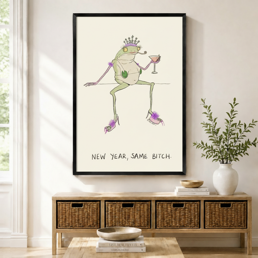 Funny new year same bitch frog queen framed wall art print hung above wicker storage console in boho entryway