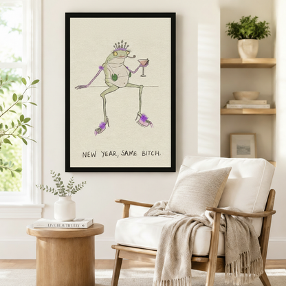 New year same bitch funny frog queen black framed poster beside armchair in minimalist Scandinavian reading corner