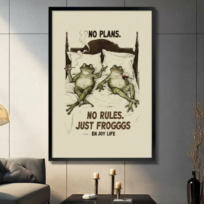 Funny frog couple wall art in black frame hung in modern living room, No Plans No Rules Just Frogggs vintage-style poster with two frogs in bed