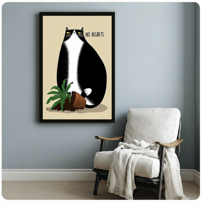 Black framed No Regrets humorous tuxedo cat and toppled plant canvas art print with bold minimalist illustration on cream background on a light blue-grey wall beside a linen armchair with draped throw