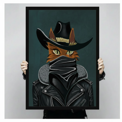 Bold graphic illustration of an orange outlaw cat with piercing green eyes black cowboy hat face mask and leather jacket on a dark teal background edgy cat wall art framed print held against a light gray background