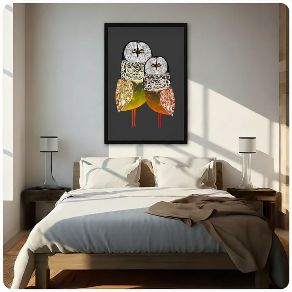 Framed owl duo folk art canvas above bed in sunlit bedroom — two owls canvas wall art for bedroom, warm neutral interior with charcoal statement print