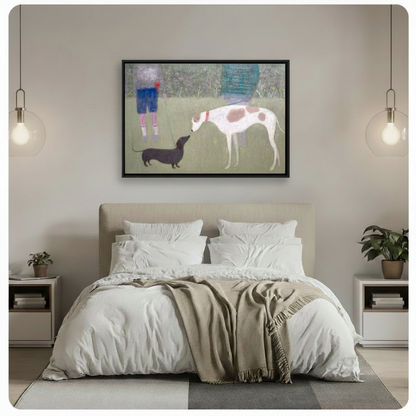 Hands holding black framed impressionist canvas print of two dogs on a park walk against neutral grey background
