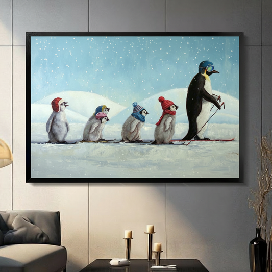 Whimsical painting of a parent penguin with ski poles leading four baby penguins in colorful winter hats on skis, in black float frame on gray paneled wall — funny penguin family wall art