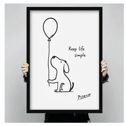 Hand-held black framed Picasso line art dog holding balloon – "Keep life simple" minimalist art print size preview