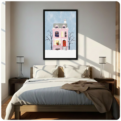 Whimsical flat illustration of a pink Victorian house with a red door and wreath surrounded by bare trees in falling snow Christmas wall art framed print above bedroom with white bedding and dark wood bedside tables
