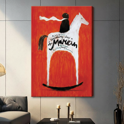 Gallery wrapped canvas art of retro Polish folk poster with black-cloaked rider atop white wooden rocking horse on vivid red background and calligraphy script, hung on dark grey wall