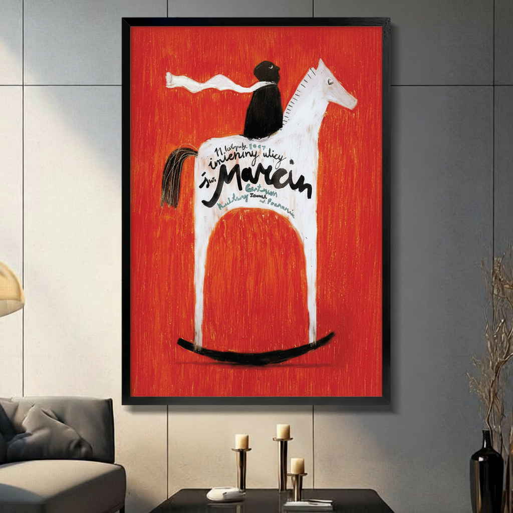 Black framed canvas print of vintage Polish poster featuring black rider on white rocking horse against bold red background with handwritten Sw. Marcin text, displayed on dark grey wall above console table
