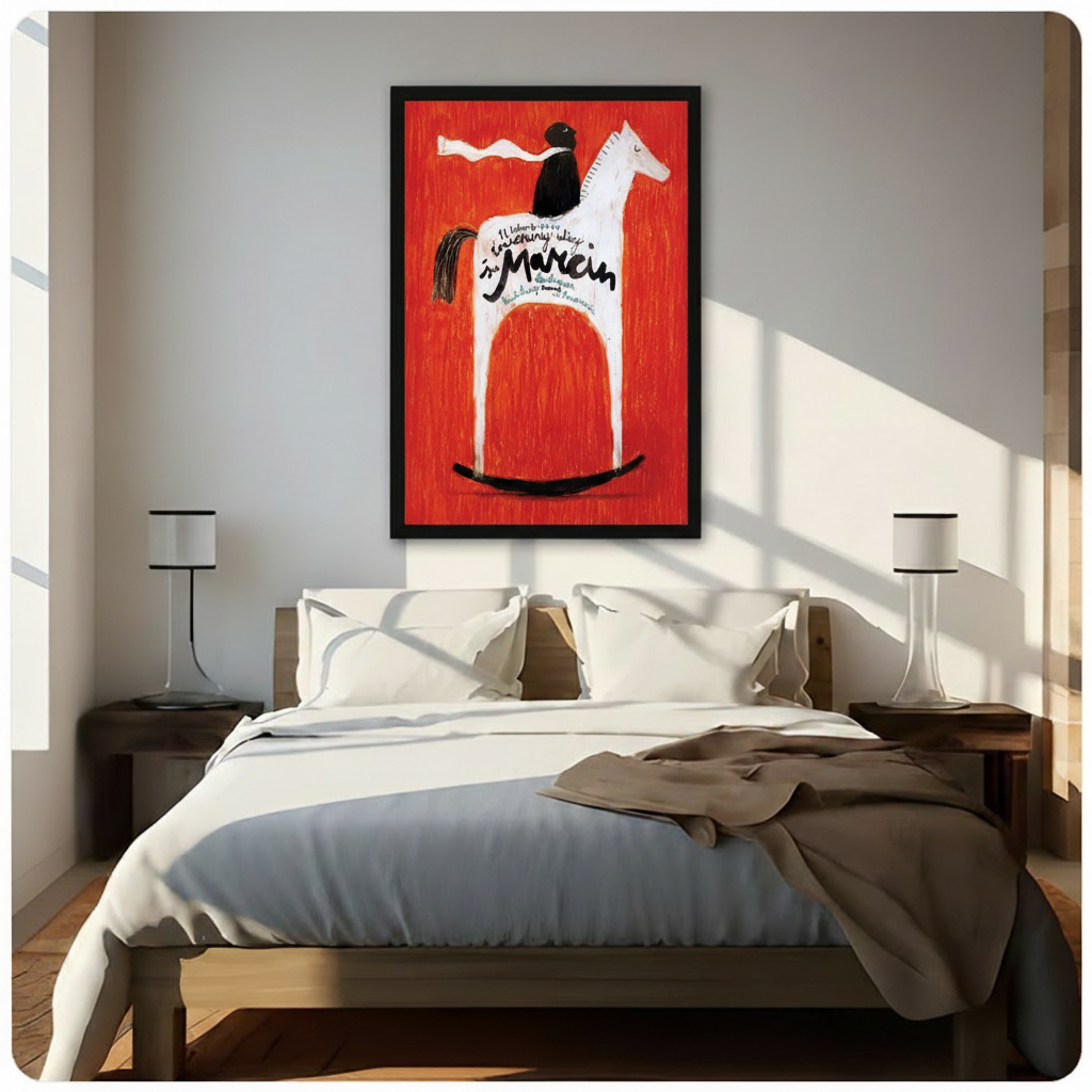 Large framed retro Polish folk art wall print above bed, depicting black-cloaked rider on white rocking horse against vivid red background with calligraphy typography, in sunlit neutral bedroom