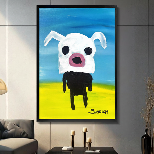 Black framed canvas wall art of a quirky white dog with black eyes and pink snout on a vivid blue sky and yellow ground background, signed Burnich, displayed in a modern living room