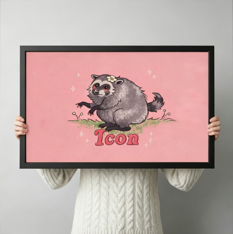 Person in a cream sweater holding a large horizontal black framed funny raccoon Icon canvas art print with a chubby gray raccoon wearing a daisy flower and the word Icon in pink retro lettering on a soft blush pink background