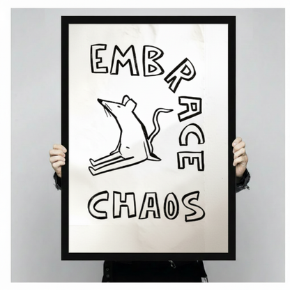 Two hands in black jacket sleeves holding a large black framed minimalist black and white hand-drawn rat with Embrace Chaos bold hand-lettered humor poster canvas art print on white background, front-facing vertical product size display