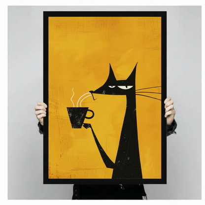 Hands holding a large black framed canvas art print of a stylized black cat with long whiskers and a grumpy face clutching a hot coffee cup, retro pop art illustration on a vivid amber yellow textured background against a light gray backdrop