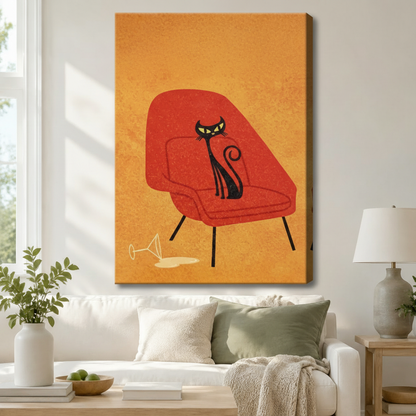 Stretched canvas wall art of a stylish mid-century black cat with glowing yellow eyes lounging on a burnt-orange retro womb chair with slim black legs and a tipped-over martini glass on a warm ochre background, hung in a bright living room above a cream sofa with a sage green pillow and a gray ceramic table lamp